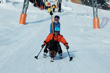  Skiing despite a disability | © Up adaptive sports 