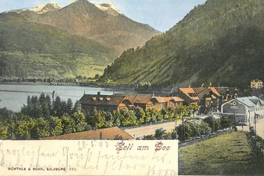 Scenic view of Zell am See with lake, mountains, and a village in the valley.
